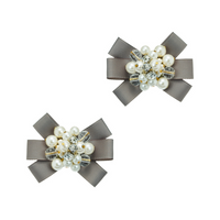 Die Romantik Schuhclips Wien zaubern mit kleinen Schleifen und Kunstperlen den besonderen Charme Wiens auf Ihre Schuhe.